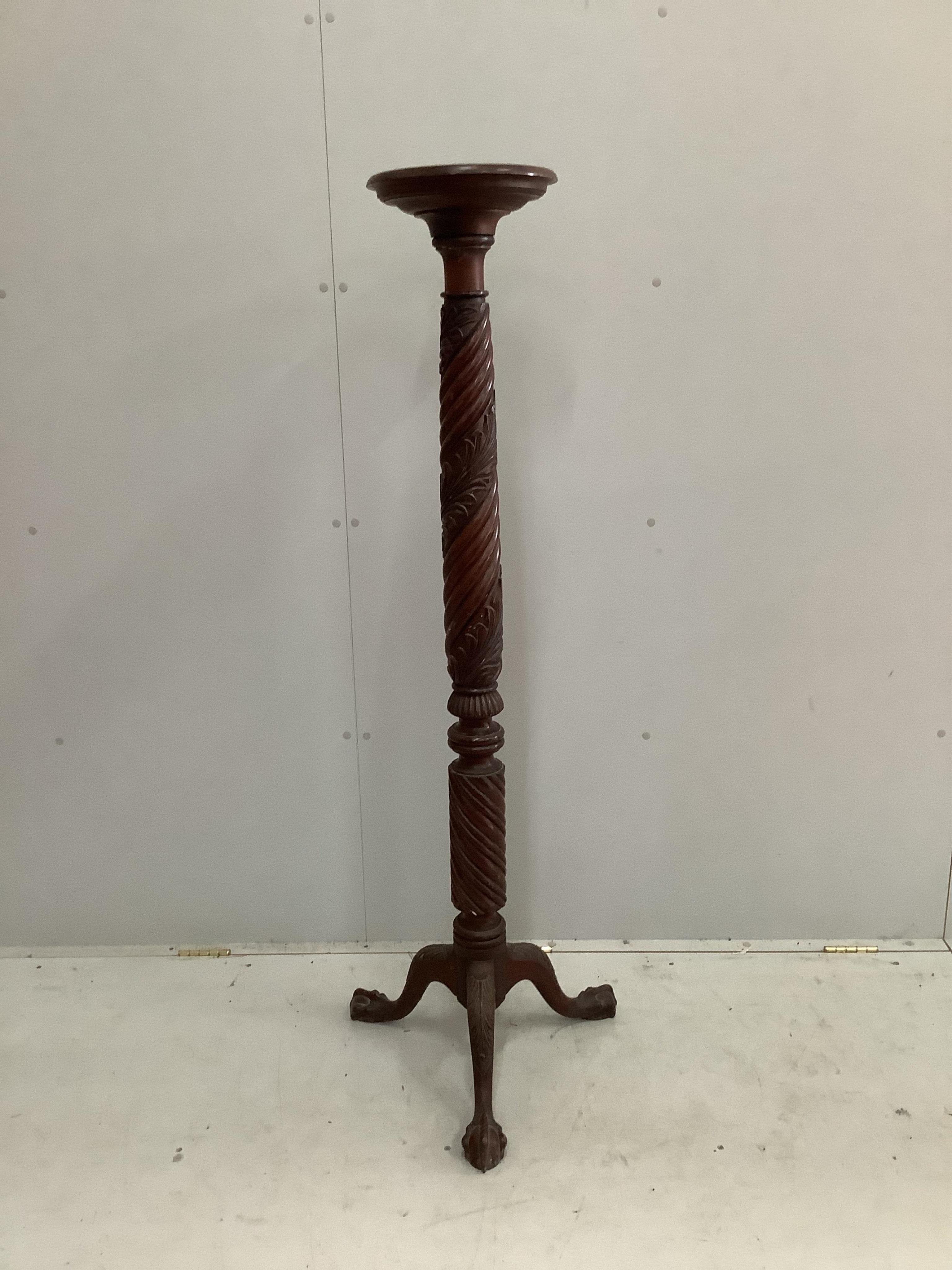 A mahogany bedpost torchere stand, height 146cm. Condition - fair